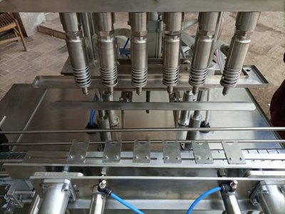 ماكينة السوائل ٦ نزل over flow : ( زيت _خل )