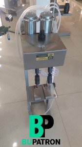 ماكينة تعبئة سوائل خفيفة بالڤاكيوم نصف أوتوماتيك