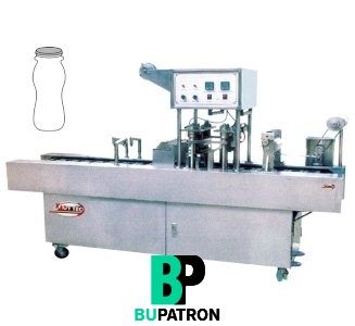 ماكينة ( تعبئة حجمية + غلق ) زجاجات بولى – أوتوماتيك  